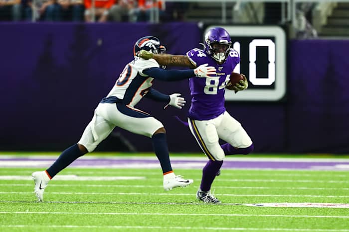 Nov 17, 2019; Minneapolis, MN, USA; Minnesota Vikings tight end Irv Smith (84) runs with the ball against Denver Broncos defensive back Duke Dawson (20) in the first quarter at U.S. Bank Stadium. Mandatory Credit: David Berding-USA TODAY Sports